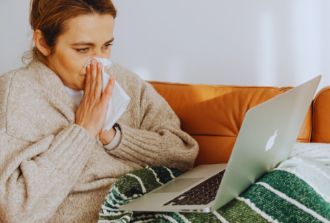 An employee working while sick