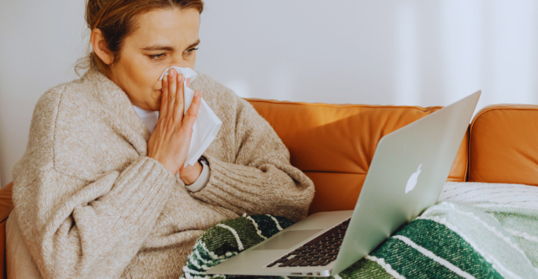 An employee working while sick